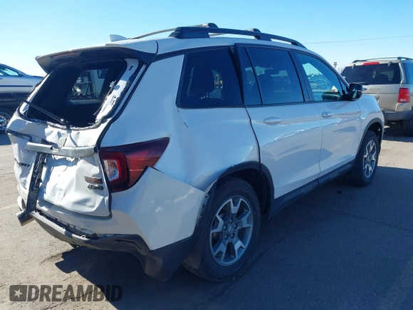2023 Honda Passport TrailSport with VIN 5FNYF8H60PB015912, listed as a IAAI auction lot 41667749 with 35,019 mi miles and . Bid and sale history available at carsss.com. Image 4.