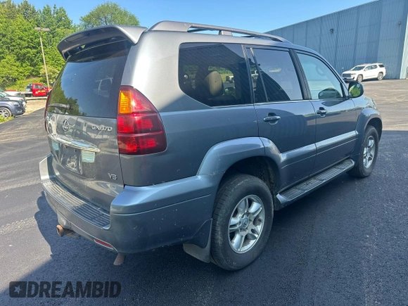 2005 Lexus GX 470 z VIN JTJBT20X050076167, wystawiony jako Copart lot #59916595 z przebiegiem 297 768 mil mil oraz Czysty tytuł • Clean title. Historia ofert i sprzedaży dostępna na DreamBid. Obrazek 4.