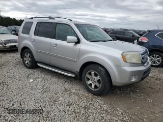 2010 Honda Pilot Touring with VIN 5FNYF4H8XAB004899, listed as a Copart auction lot 49596535 with 210,267 mi miles and Clean Title. Bid and sale history available at DreamBid. Image 4.