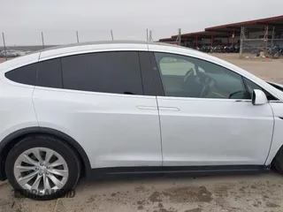 2020 Tesla Model X Long Range with VIN 5YJXCDE2XLF284847, listed as a IAAI auction lot 41595151 with 29,466 mi miles. Bid and sale history available at carsss.com. Image 14.