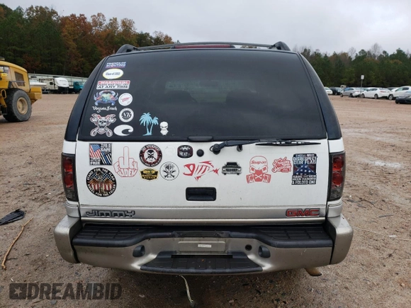 2001 GMC Jimmy SLT with VIN 1GKDT13W712155718, listed as a Copart auction lot 80688554 with 114,116 mi miles and Salvage Title. Bid and sale history available at carsss.com. Image 6.