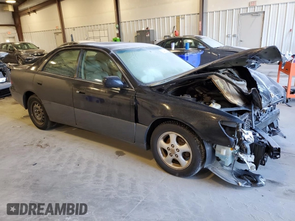 1998 Lexus ES 300 Luxury Sport Sdn with VIN JT8BF28G0W5044806, listed as a Copart auction lot 83248754 with 276,797 mi miles and Salvage Title. Bid and sale history available at carsss.com. Image 4.