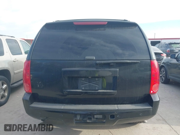 2012 GMC Yukon SLT with VIN 1GKS2CE06CR150096, listed as a IAAI auction lot 41703820 with 308,958 mi miles. Bid and sale history available at carsss.com. Image 16.
