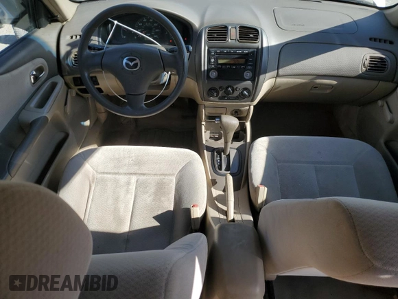 2002 Mazda Protege DX with VIN JM1BJ225520525472, listed as a Copart auction lot 45699915 with 183,457 mi miles and Salvage Title. Bid and sale history available at DreamBid. Image 8.