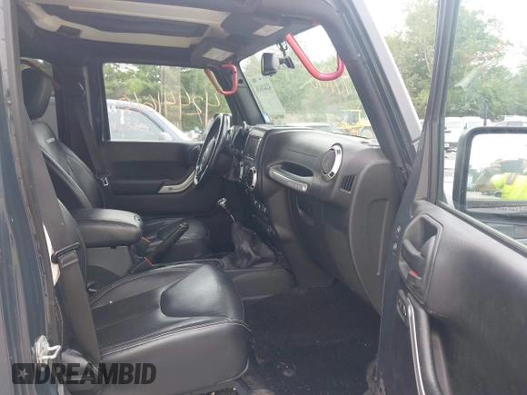 2016 Jeep Wrangler Unlimited Rubicon with VIN 1C4HJWFG6GL346862, listed as a IAAI auction lot 42441610 with 94,227 mi miles and . Bid and sale history available at DreamBid. Image 5.
