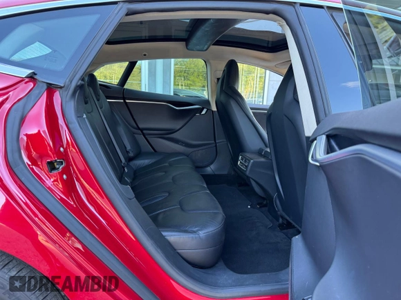 2013 Tesla Model S with VIN 5YJSA1CG5DFP18929, listed as a Copart auction lot 67245595 with 111,151 mi miles and Clean title. Bid and sale history available at DreamBid. Image 6.