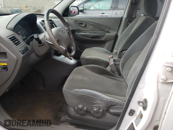 2007 Hyundai Tucson SE with VIN KM8JN72D27U569221, listed as a Copart auction lot 74250944 with 195,097 mi miles and Salvage Title. Bid and sale history available at carsss.com. Image 7.