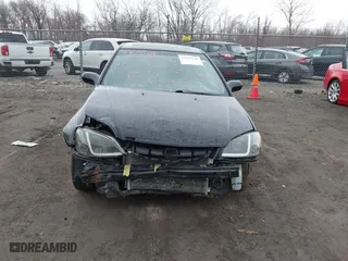 2003 Honda Civic EX with VIN 1HGEM229X3L002571, listed as a IAAI auction lot 41705549 with 134,689 mi miles. Bid and sale history available at carsss.com. Image 13.