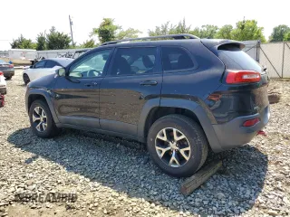 2015 Jeep Cherokee Trailhawk with VIN 1C4PJMBS6FW785891, listed as a Copart auction lot 61040565 with 156,421 mi miles and Clean title. Bid and sale history available at DreamBid. Image 2.