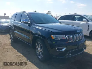 2019 Jeep Grand Cherokee Overland with VIN 1C4RJECG4KC556145, listed as a IAAI auction lot 41555207 with 59,630 mi miles. Bid and sale history available at carsss.com. Image 1.