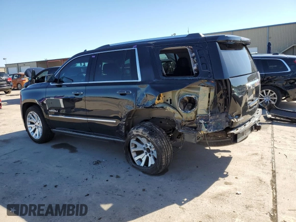 2015 GMC Yukon Denali z VIN 1GKS1CKJ8FR748131, wystawiony jako Copart lot #55213205 z przebiegiem 101 758 mil mil oraz Szkoda całkowita • Salvage title. Historia ofert i sprzedaży dostępna na DreamBid. Obrazek 2.