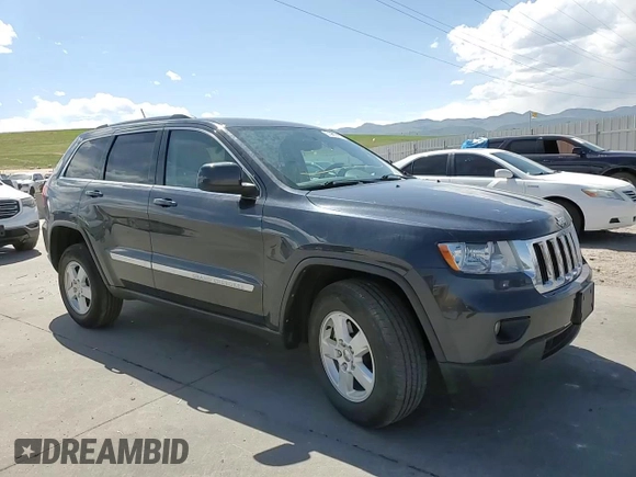 2013 Jeep Grand Cherokee Laredo с VIN 1C4RJFAG7DC645932, выставлен на аукционе Copart как лот 57969715 с пробегом 165 717 миль миль и Списание • Salvage title. История ставок и продаж доступна на DreamBid. Изображение 14.