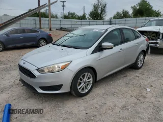 2017 Ford Focus SE with VIN 1FADP3F2XHL325729, listed as a Copart auction lot 52740065 with 110,800 mi miles and Salvage title. Bid and sale history available at DreamBid. Image 1.