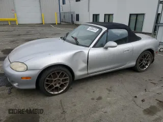2004 Mazda MX-5 Miata LS with VIN JM1NB353440402453, listed as a Copart auction lot 45064475 with 151,508 mi miles and Salvage title. Bid and sale history available at DreamBid. Image 1.
