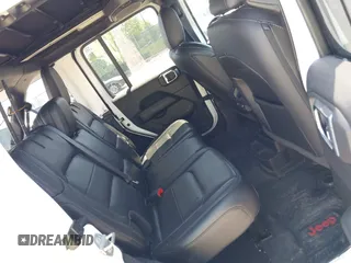2021 Jeep Wrangler Unlimited Sahara z VIN 1C4HJXEN2MW528137, wystawiony jako IAAI lot #42134514 z przebiegiem 50 030 mil mil oraz . Historia ofert i sprzedaży dostępna na DreamBid. Obrazek 8.