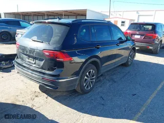 2022 Volkswagen Tiguan S with VIN 3VV1B7AX7NM107779, listed as a IAAI auction lot 41210258 with 57,154 mi miles. Bid and sale history available at carsss.com. Image 4.