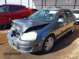 2007 Volkswagen Jetta 2.5 z VIN 3VWRF71K37M101410, wystawiony jako IAAI lot #41863276 z przebiegiem 195 616 mil mil oraz . Historia ofert i sprzedaży dostępna na DreamBid. Obrazek 17.