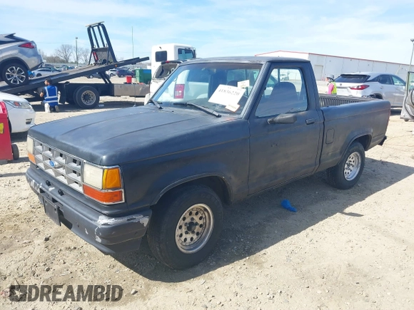 1992 Ford Ranger XLT z VIN 1FTCR10X3NUA73868, wystawiony jako IAAI lot #41836220 z przebiegiem 97 165 mil mil oraz . Historia ofert i sprzedaży dostępna na DreamBid. Obrazek 17.