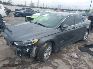 2017 Ford Fusion Energi SE with VIN 3FA6P0PU4HR306053, listed as a IAAI auction lot 41294944 with 88,603 mi miles. Bid and sale history available at carsss.com. Image 18.
