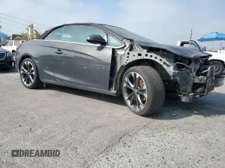 2016 Buick Cascada Premium с VIN W04WT3N58GG076360, выставлен на аукционе Copart как лот 62735365 с пробегом 70 503 миль миль и Списание • Salvage title. История ставок и продаж доступна на DreamBid. Изображение 4.