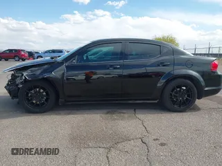 2014 Dodge Avenger SE z VIN 1C3CDZAGXEN130092, wystawiony jako IAAI lot #42216767 z przebiegiem 131 177 mil mil oraz . Historia ofert i sprzedaży dostępna na DreamBid. Obrazek 15.