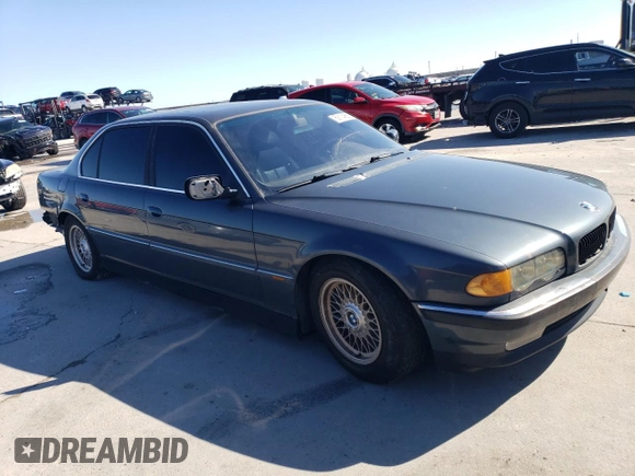 1999 BMW 7 Series 740il with VIN WBAGH8335XDP05338, listed as a Copart auction lot 89114855 with 156,049 mi miles and Salvage Title. Bid and sale history available at carsss.com. Image 4.