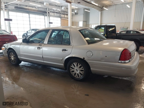 2005 Ford Crown Victoria LX with VIN 2FAFP74W95X158705, listed as a IAAI auction lot 41593553 with 276,940 mi miles. Bid and sale history available at carsss.com. Image 14.
