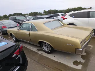 1967 Pontiac GTO z VIN 242077Z108825, wystawiony jako Copart lot #74747314 z przebiegiem 84 793 mil mil oraz Szkoda całkowita • Salvage title. Historia ofert i sprzedaży dostępna na DreamBid. Obrazek 2.