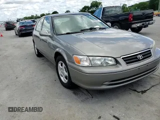 2000 Toyota Camry CE z VIN 4T1BG22KXYU639808, wystawiony jako Copart lot #56606985 z przebiegiem 119 678 mil mil oraz Szkoda całkowita • Salvage title. Historia ofert i sprzedaży dostępna na DreamBid. Obrazek 14.
