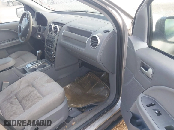 2006 Ford Freestyle SE z VIN 1FMZK01176GA41620, wystawiony jako IAAI lot #41703818 z przebiegiem 169 954 mil mil oraz . Historia ofert i sprzedaży dostępna na DreamBid. Obrazek 5.