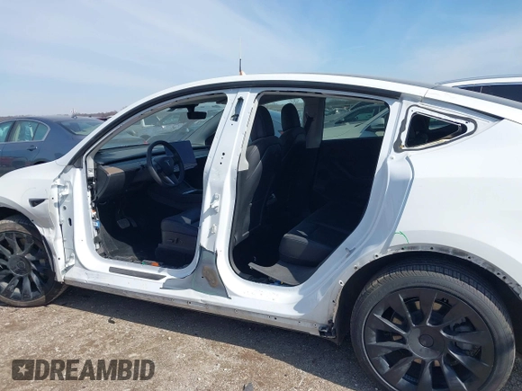 2022 Tesla Model Y Long Range with VIN 7SAYGDEE4NF428434, listed as a IAAI auction lot 41578503 with 35,460 mi miles and . Bid and sale history available at DreamBid. Image 14.