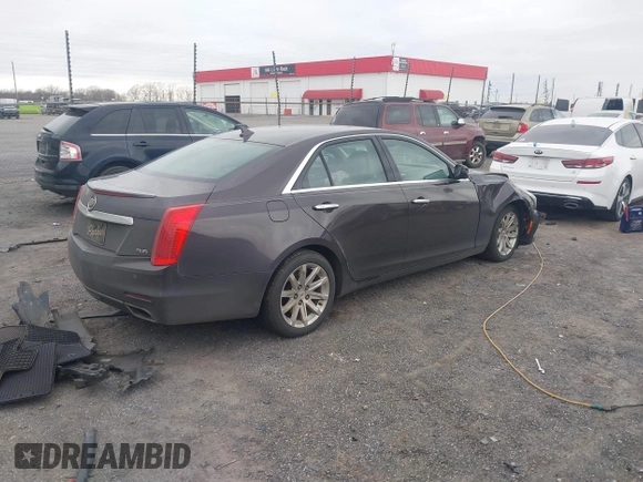 2014 Cadillac CTS Luxury RWD z VIN 1G6AR5S3XE0192441, wystawiony jako IAAI lot #41707095 z przebiegiem 205 904 mil mil oraz . Historia ofert i sprzedaży dostępna na DreamBid. Obrazek 4.