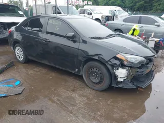 2018 Toyota Corolla L with VIN 5YFBURHE8JP854274, listed as a IAAI auction lot 42381105 with 106,689 mi miles and . Bid and sale history available at DreamBid. Image 1.