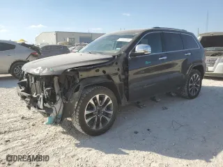 2017 Jeep Grand Cherokee Overland with VIN 1C4RJECG2HC614746, listed as a Copart auction lot 77362304 with 86,330 mi miles and Salvage Title. Bid and sale history available at carsss.com. Image 1.