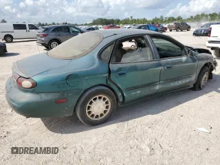 1997 Ford Taurus LX z VIN 1FALP53S1VG316689, wystawiony jako Copart lot #67168694 z przebiegiem 211 414 mil mil oraz Szkody całkowita. Historia ofert i sprzedaży dostępna na DreamBid. Obrazek 3.