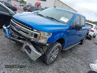 2019 Ford F-150 XL with VIN 1FTFW1E58KFA68470, listed as a IAAI auction lot 40823381 with 174,401 mi miles and . Bid and sale history available at DreamBid. Image 2.