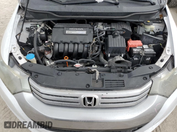 2010 Honda Insight EX with VIN JHMZE2H79AS038112, listed as a Copart auction lot 54794785 with 183,457 mi miles and Salvage Title. Bid and sale history available at DreamBid. Image 11.