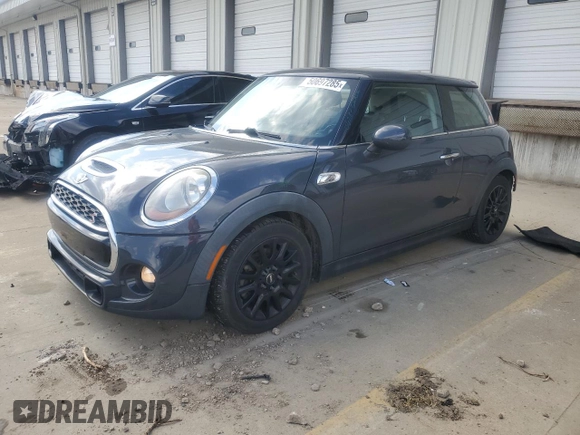 2015 MINI Hardtop S with VIN WMWXP7C59F2A34428, listed as a Copart auction lot 50697285 with 131,564 mi miles and Salvage Title. Bid and sale history available at DreamBid. Image 1.