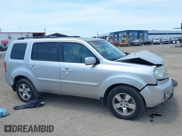 2011 Honda Pilot EX-L with VIN 5FNYF4H54BB099550, listed as a IAAI auction lot 42107327 with 217,050 mi miles and . Bid and sale history available at carsss.com. Image 13.