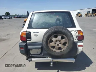 1996 Toyota RAV4 with VIN JT3GP10V3T0005875, listed as a Copart auction lot 57359135 with 240,763 mi miles and Salvage Title. Bid and sale history available at DreamBid. Image 6.