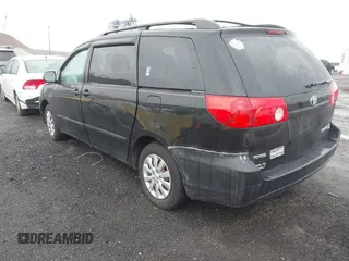 2010 Toyota Sienna CE with VIN 5TDKK4CC6AS343068, listed as a IAAI auction lot 41973330 with 327,086 mi miles. Bid and sale history available at carsss.com. Image 3.