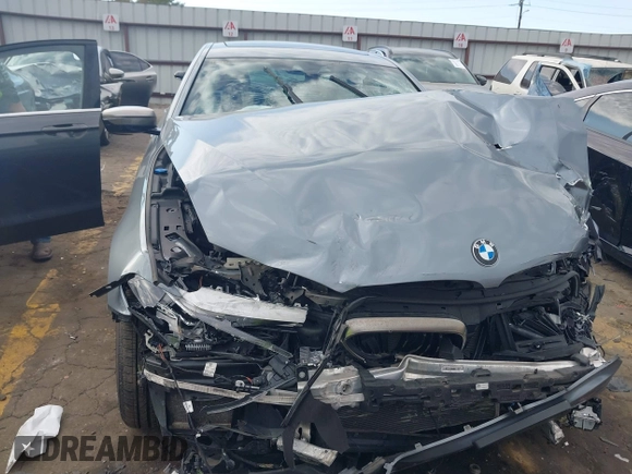 2018 BMW 5 Series M550i xDrive with VIN WBAJB9C53JB286035, listed as a IAAI auction lot 40590380 with 57,072 mi miles and . Bid and sale history available at carsss.com. Image 6.