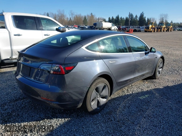 2020 Tesla Model 3 Long Range with VIN 5YJ3E1EB6LF647510, listed as a IAAI auction lot 41692902 with 69,736 mi miles. Bid and sale history available at carsss.com. Image 4.