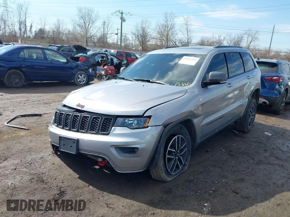 2021 Jeep Grand Cherokee Trailhawk with VIN 1C4RJFLG6MC683973, listed as a IAAI auction lot 41662344 with 95,890 mi miles. Bid and sale history available at carsss.com. Image 2.
