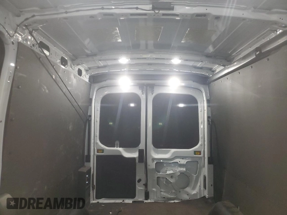 2022 Ford E-Transit Cargo z VIN 1FTBW9CK2NKA33103, wystawiony jako Copart lot #62696104 z przebiegiem 27 706 mil mil oraz Szkoda całkowita • Salvage title. Historia ofert i sprzedaży dostępna na DreamBid. Obrazek 10.