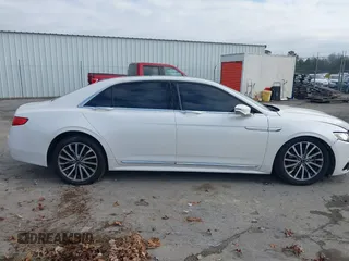 2017 Lincoln Continental Select with VIN 1LN6L9TK3H5605885, listed as a IAAI auction lot 41123925 with 142,077 mi miles. Bid and sale history available at carsss.com. Image 13.