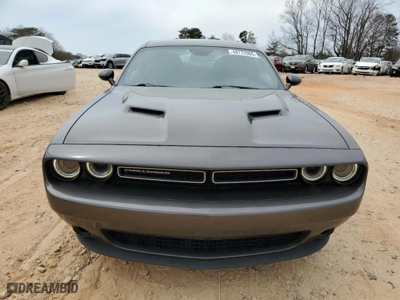 2021 Dodge Challenger SXT with VIN 2C3CDZAG0MH526491, listed as a Copart auction lot 48772985 with 84,300 mi miles and Salvage Title. Bid and sale history available at carsss.com. Image 5.