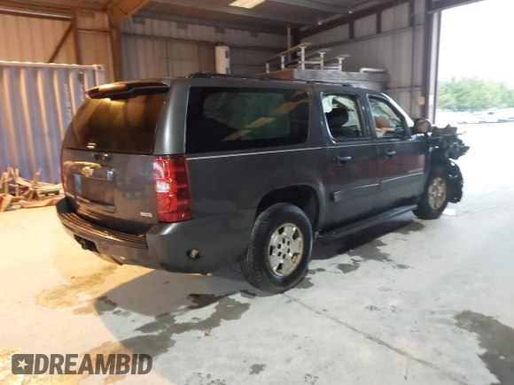 2010 Chevrolet Suburban LS with VIN 1GNUCHE01AR158111, listed as a IAAI auction lot 41602157 with 263,227 mi miles. Bid and sale history available at carsss.com. Image 4.