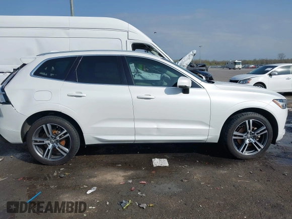2019 Volvo XC60 Momentum with VIN LYV102DK0KB219297, listed as a IAAI auction lot 41781458 with 80,524 mi miles and . Bid and sale history available at DreamBid. Image 13.