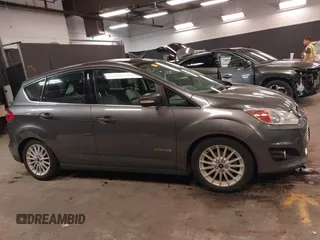 2013 Ford C-Max SEL z VIN 1FADP5BU9DL531704, wystawiony jako IAAI lot #42228841 z przebiegiem 91 808 mil mil oraz . Historia ofert i sprzedaży dostępna na DreamBid. Obrazek 13.